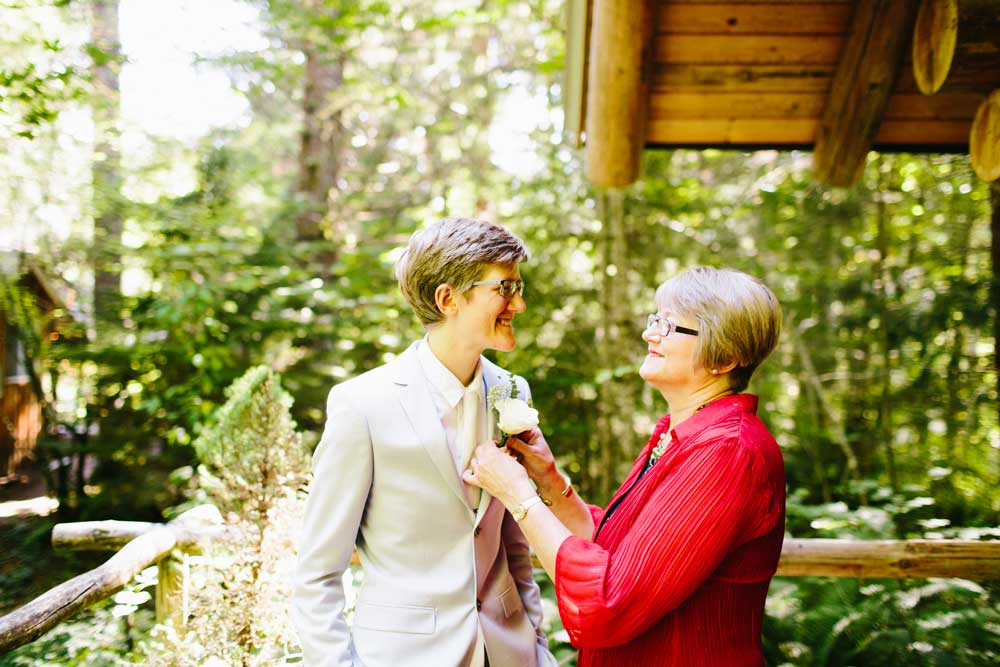 Intimate woodsy DIY fall wedding at Wellspring Spa | butch lesbian | suit