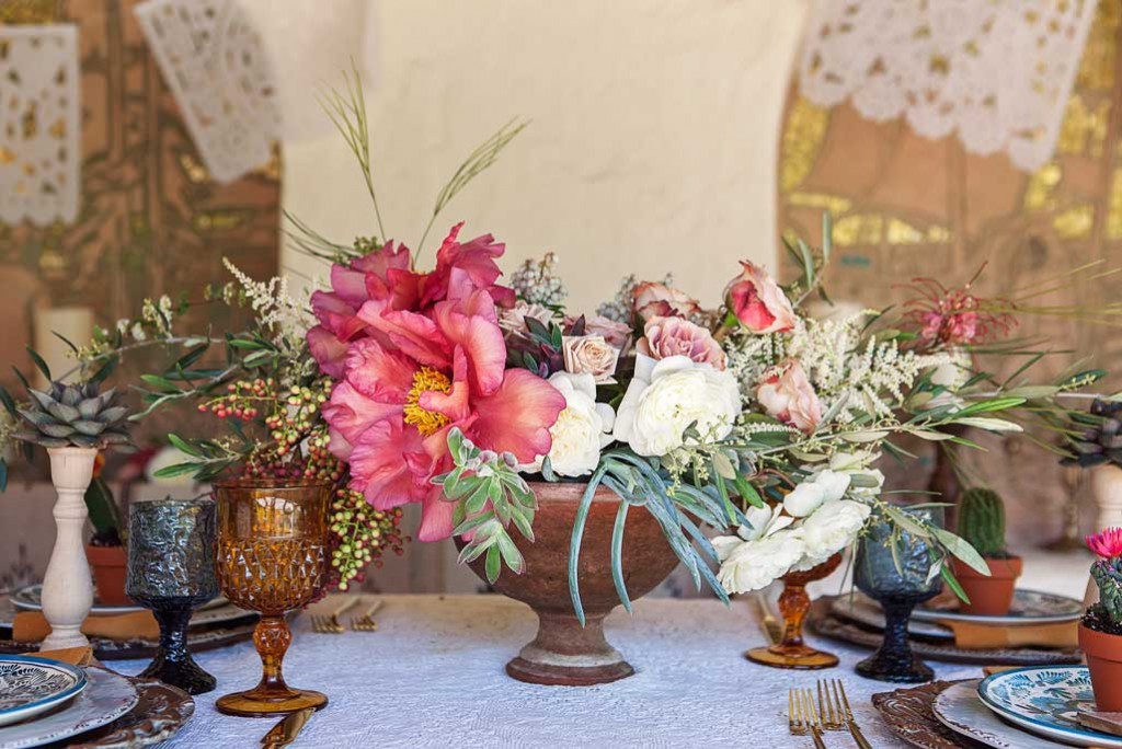 table decor and centerpiece at rustic Mexican wedding