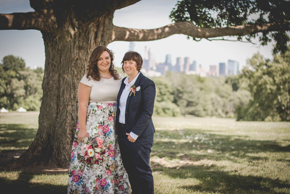 Casual beer themed wedding in Philadelphia floral dress suit outdoor wedding