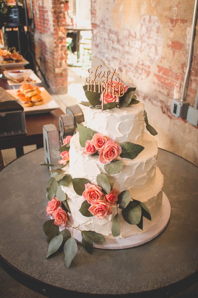 Casual beer themed wedding in Philadelphia floral cake white frosting