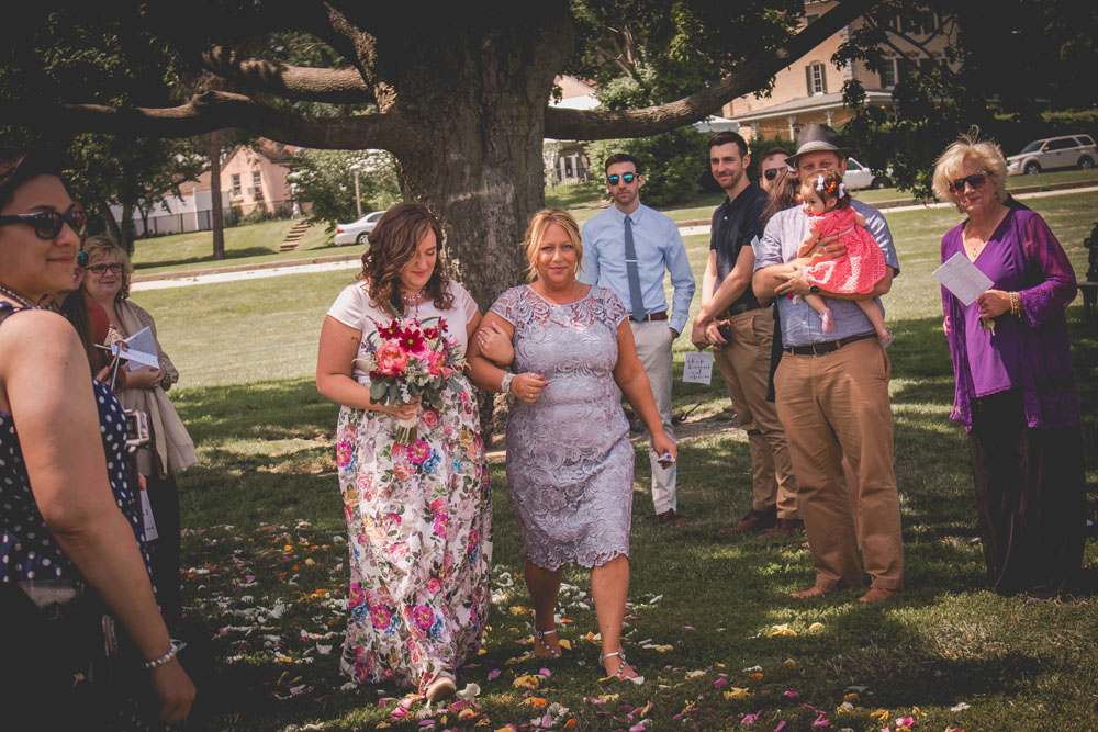 Casual beer themed wedding in Philadelphia floral dress down the aisle