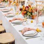 an orange-themed wedding reception