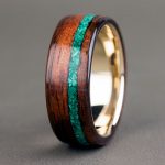 wooden-rings-malachite-inlay-and-english-oak-wood-with-14K-gold-band.jpg
