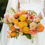 an orange-colored wedding bouquet