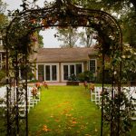 View of Cary Hill historic manor from the wedding arch