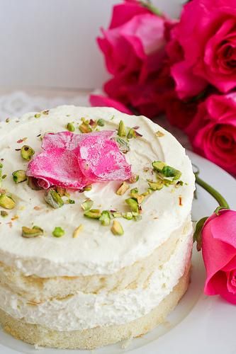 A Persian love cake topped with candied rose petals and pistachios ... yum! | Photo by kokocooks.com, recipe adapted by Bon Appetite magazine