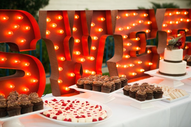 cakes and sweets table tall standing lights display wedding Michael Segal Photography