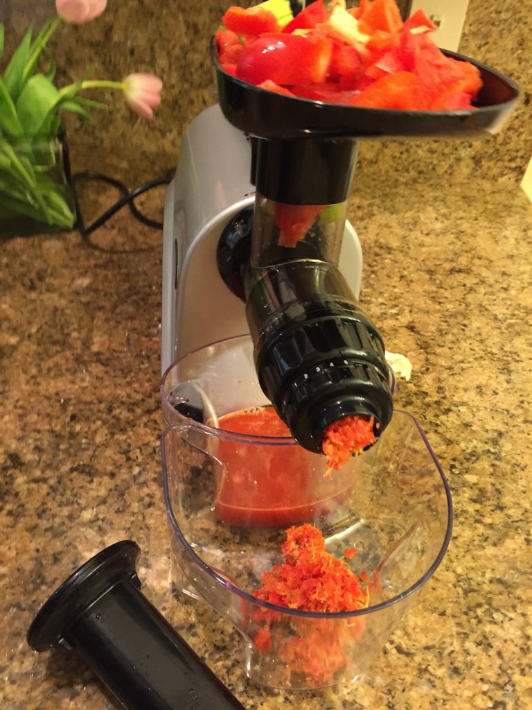Run the red peppers, celery and ginger root through the juicer. 