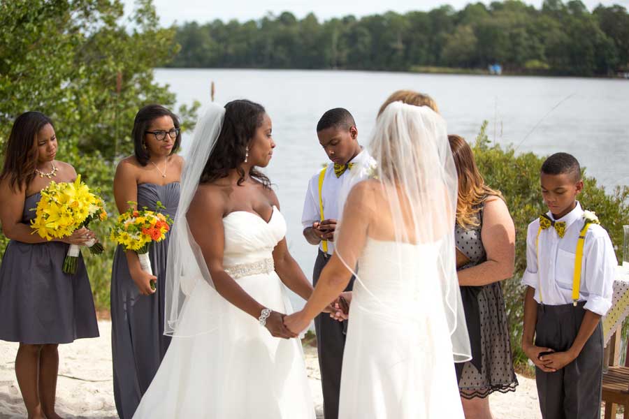 lesbian brides marry by lake