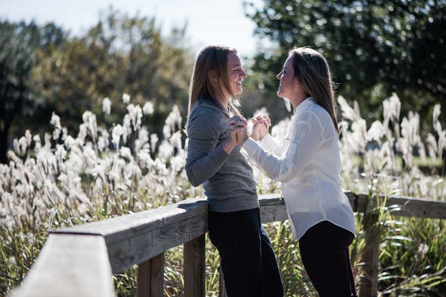 lesbian engagement train train tracks outdoors proposal story photography