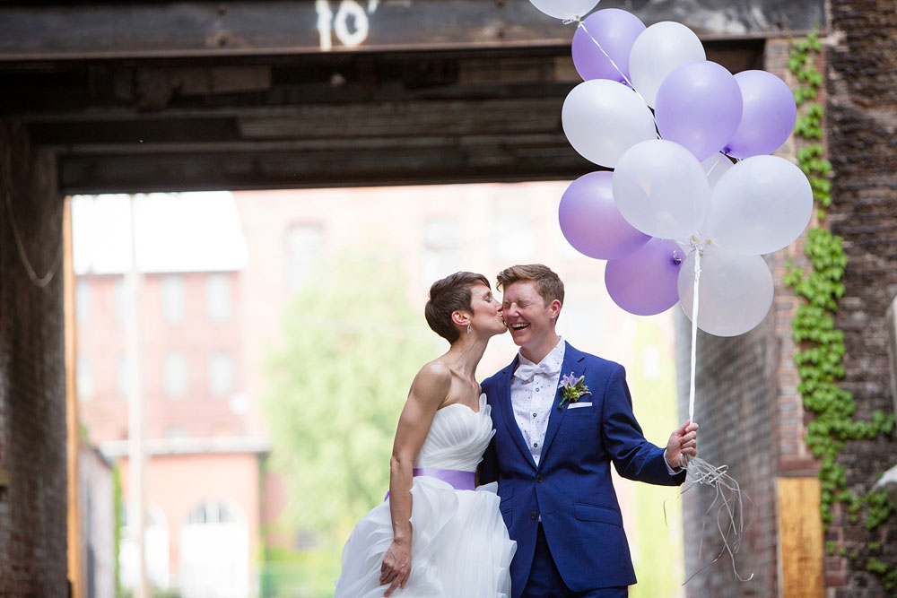 Balloons and ice cream sandwiches at fun purple, navy and white Massachusetts wedding