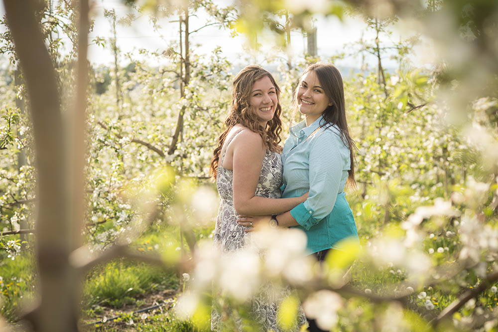 Ontario orchard engagement photography shoot smiling