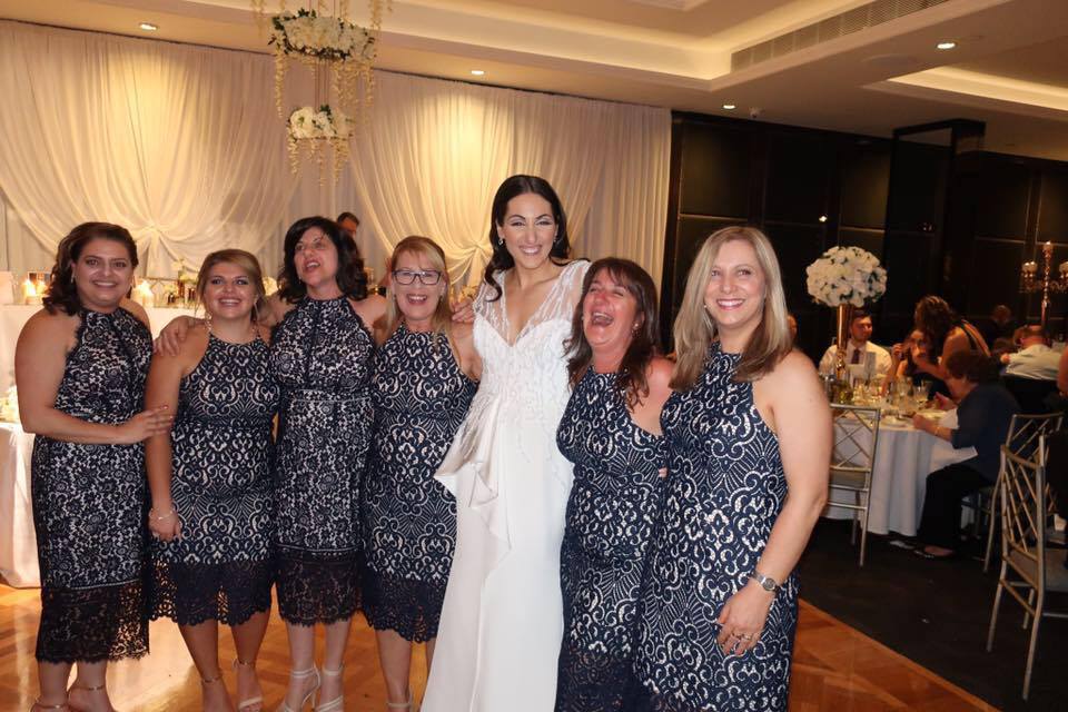 wedding guests wear the same dress