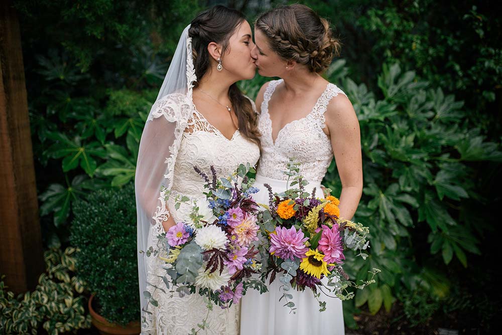 and Eliza brought their farm to their wedding for their North Carolina lesb...