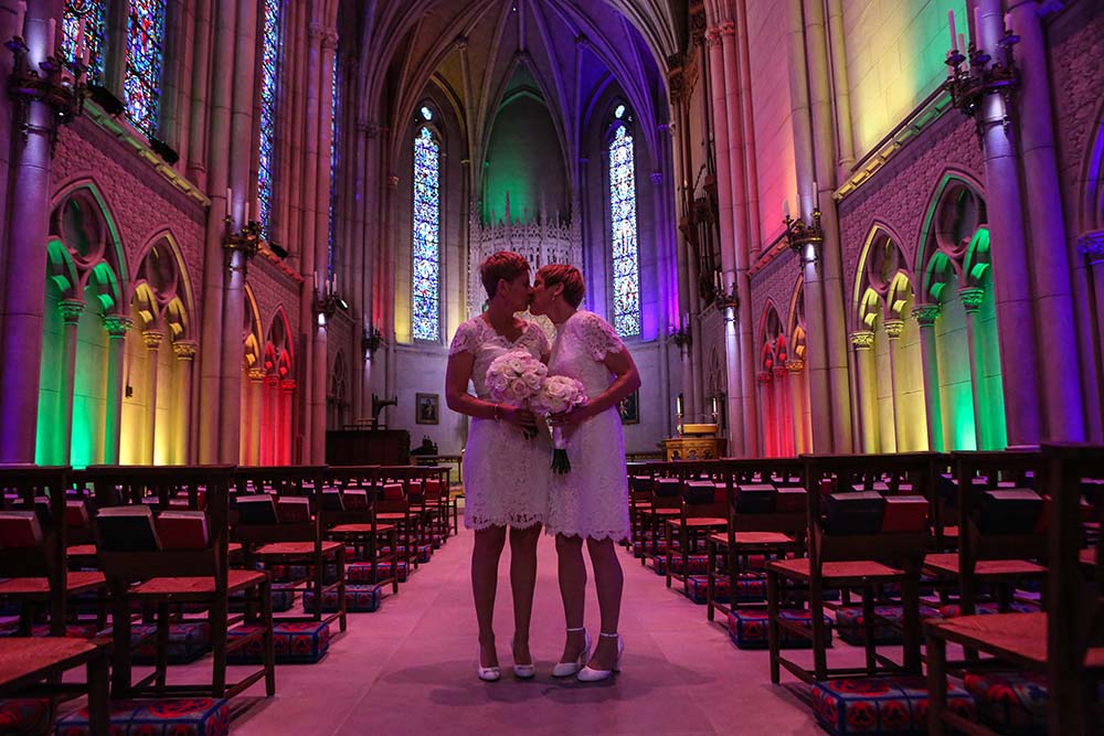 Rainbow stained glass church wedding