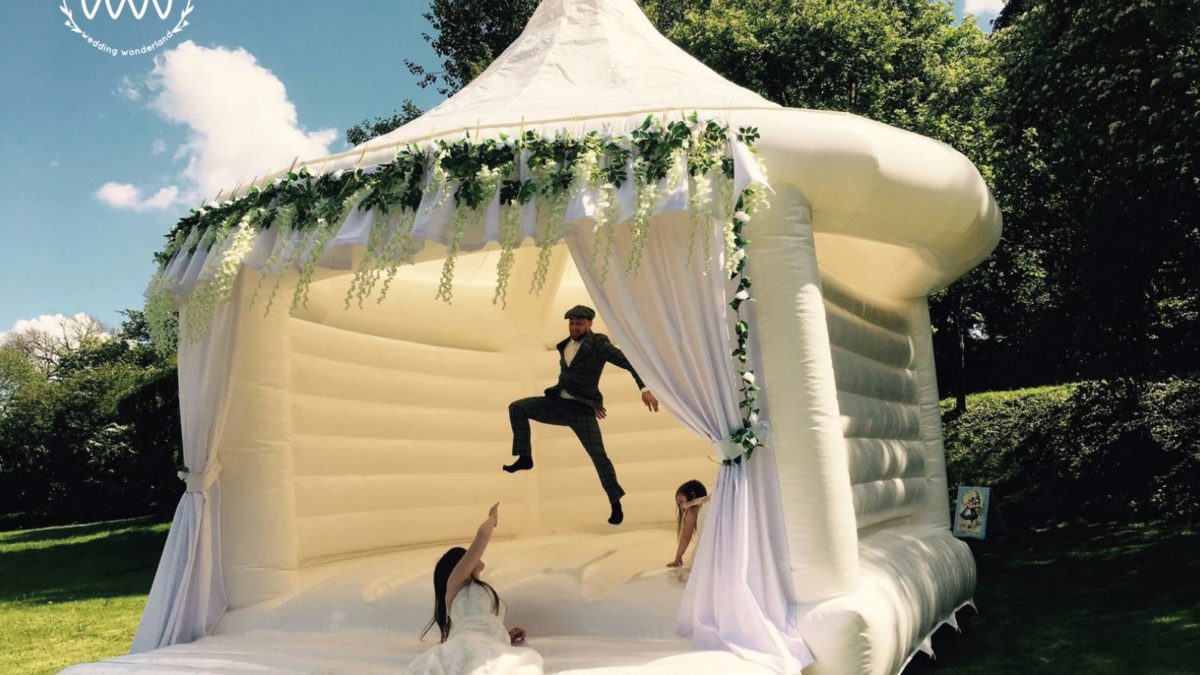 Wedding bounce house: fun for guests of all ages!