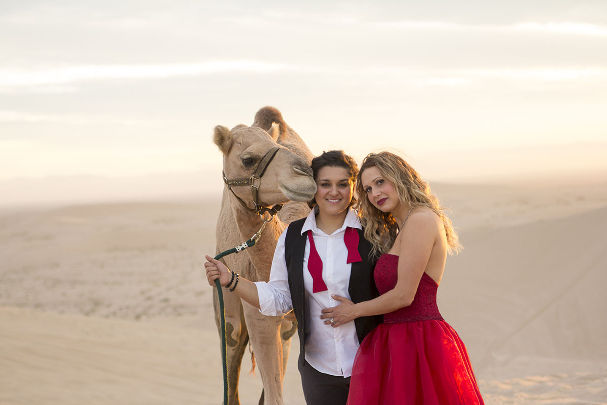 Egyptian engagement photos at sunset with camel two brides