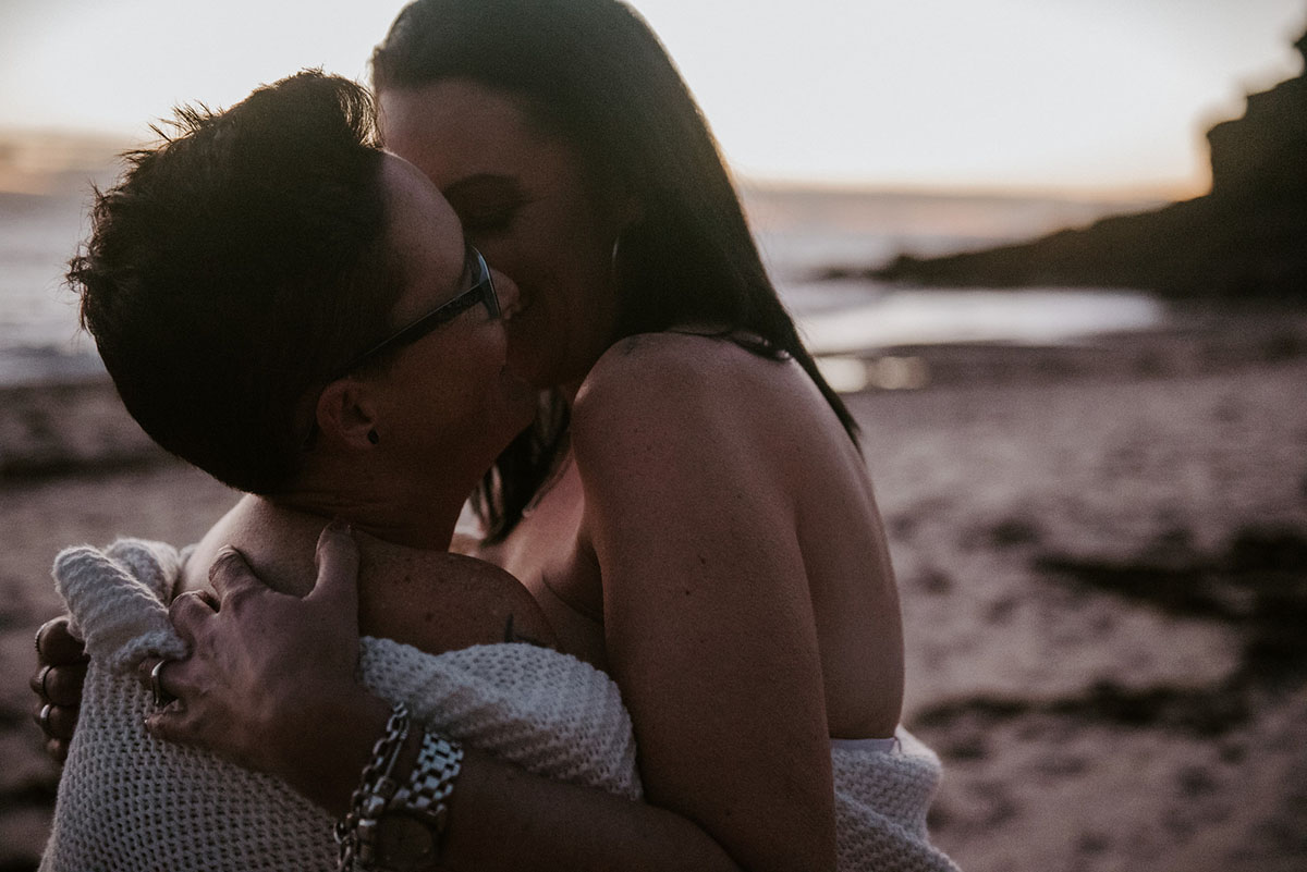 Same-sex engagement photography session on the coast of South Australia kiss beach