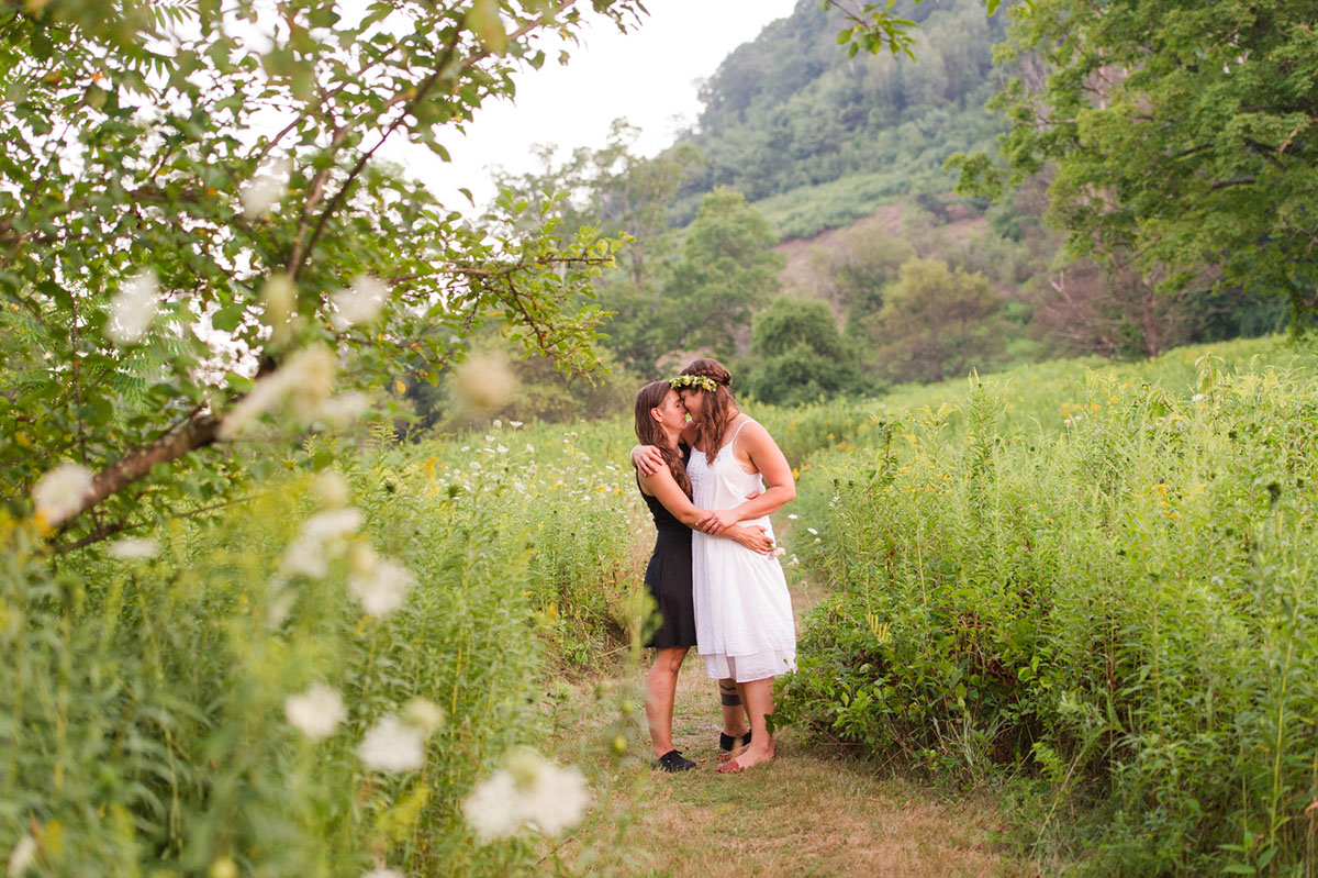 Lesbian wedding with summer garden and creative floral bouquets wildflowers outdoors