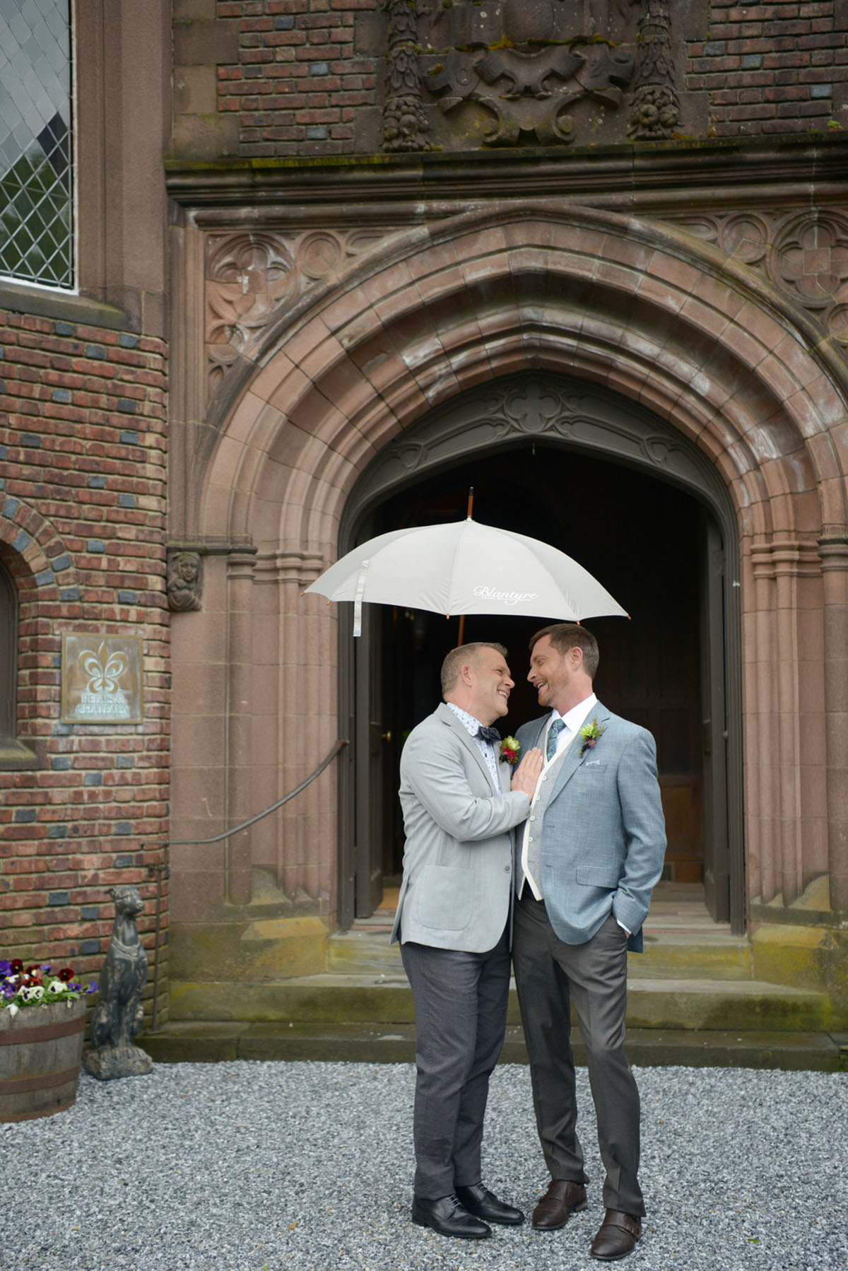 Modern gay wedding at Blantyre in the Berkshires umbrella