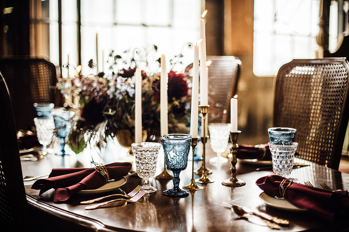 Pop-up styled lesbian wedding shoot in grays and blues table setting