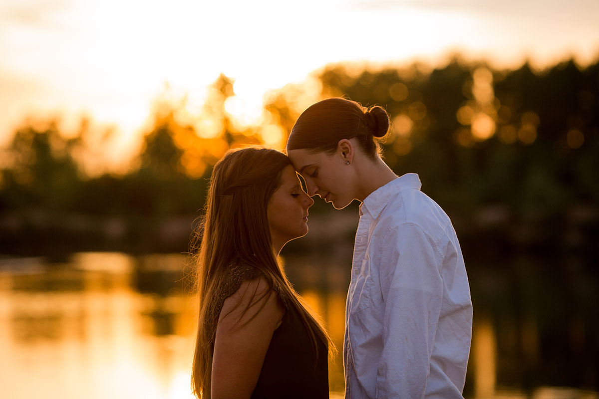Sunset family portraits by the lake intimate love
