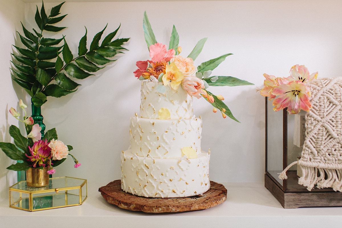 Tropical boho wedding photo shoot cake decor