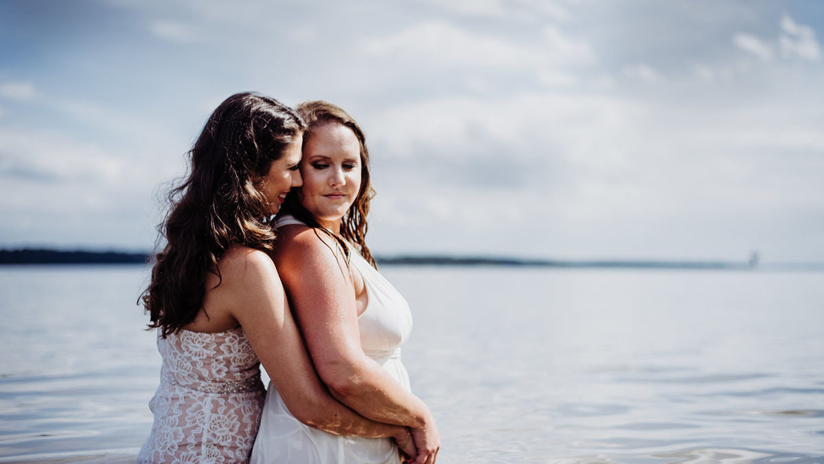 Two brides trash their wedding dresses in a styled shoot