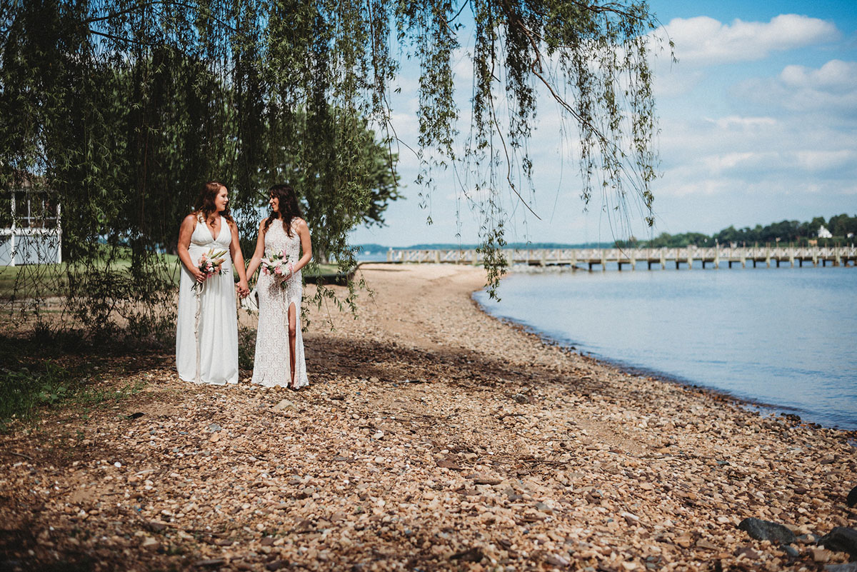 Two brides trash their wedding dresses in a styled shoot flowers