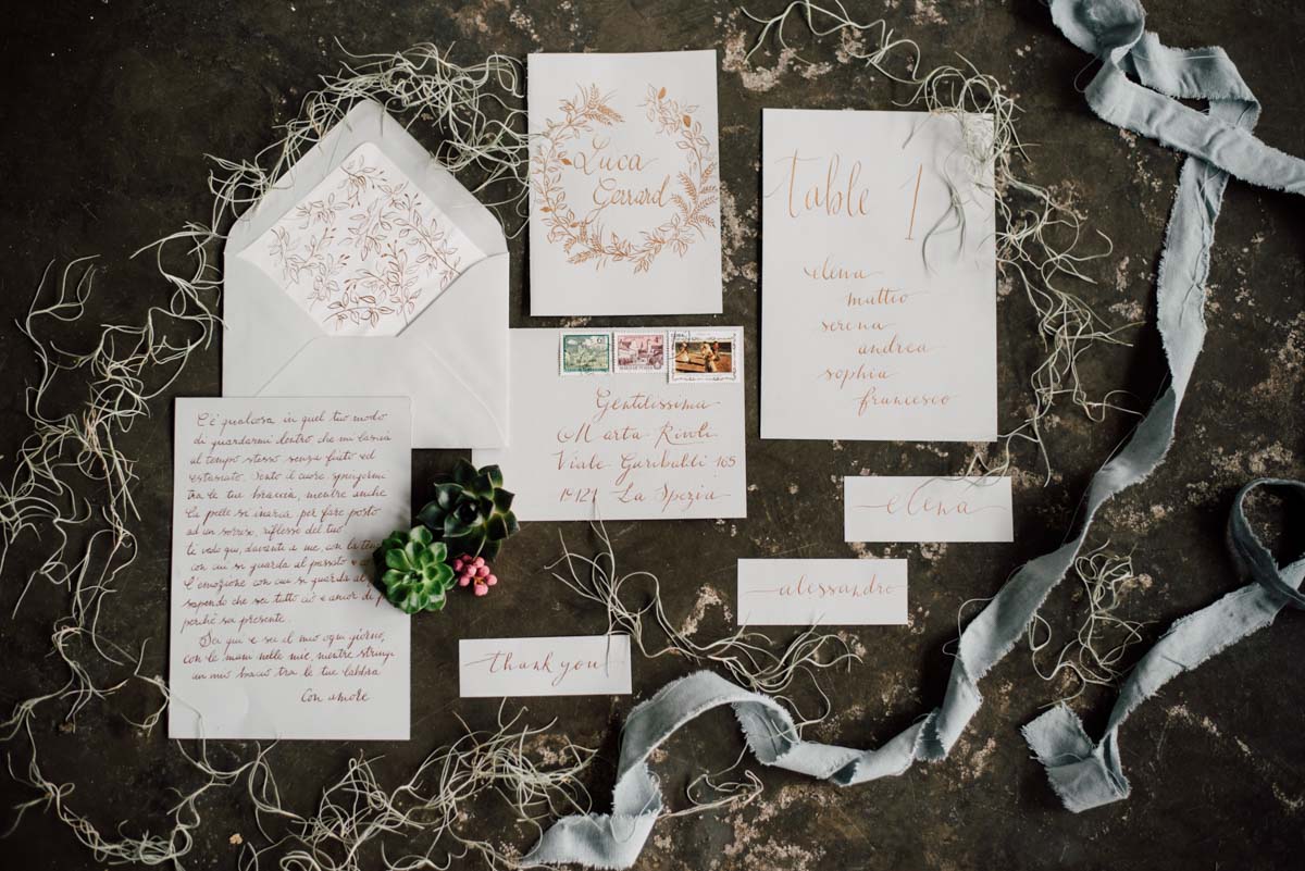 invitations script Italian moss rustic moody destination gay wedding of your dreams Serena Genovese, photographer Equally Wed LGBTQ weddings