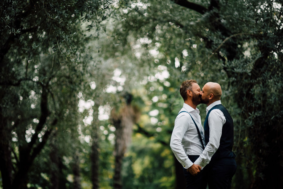 kiss Italian rustic moody destination gay wedding of your dreams Serena Genovese, photographer Equally Wed LGBTQ weddings