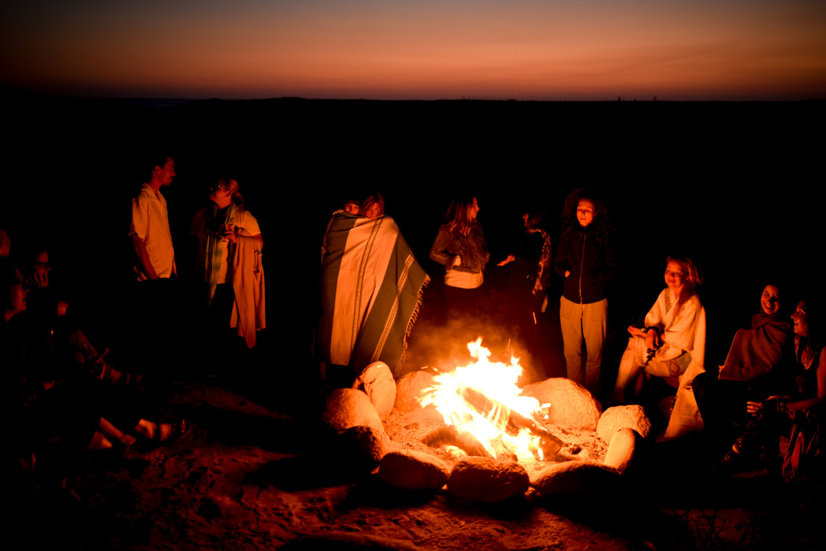 How to nourish your soul - group circle around a fire in Todos los Santos, Mexico 2T Photo Equally Wed