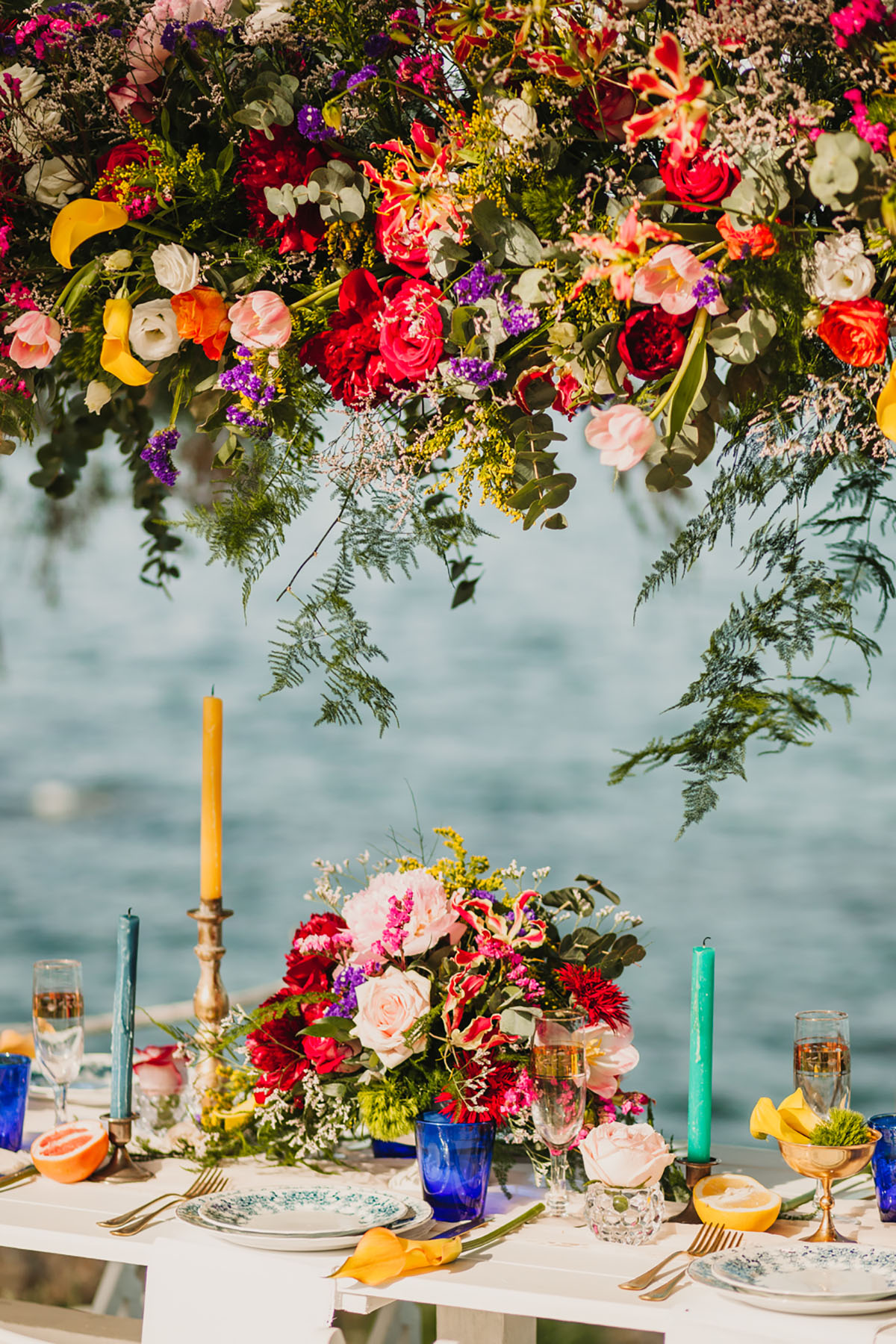 Eclectic colorful Frida Kahlo beach wedding inspiration bright flowers florals tablescape