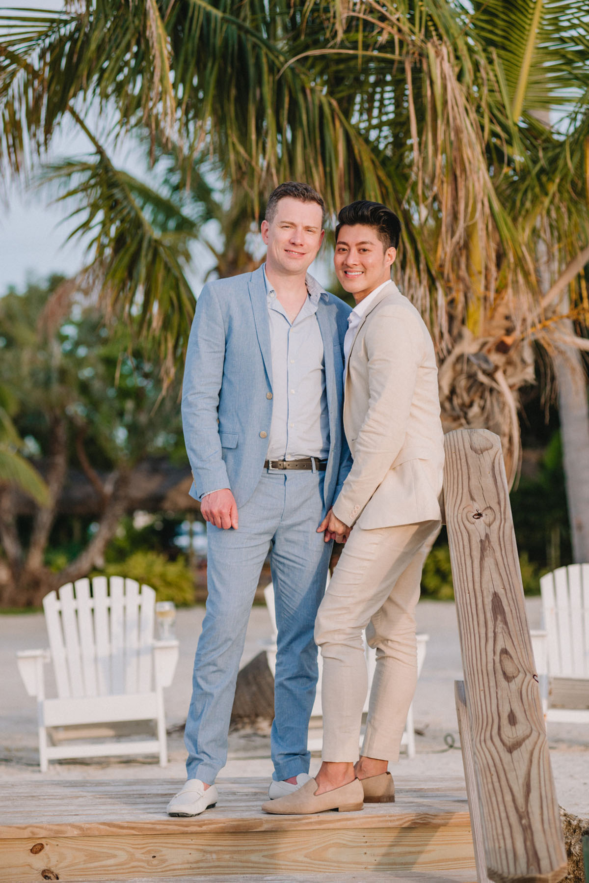 Intimate Florida Keys tropical wedding two grooms blue tan tuxedo