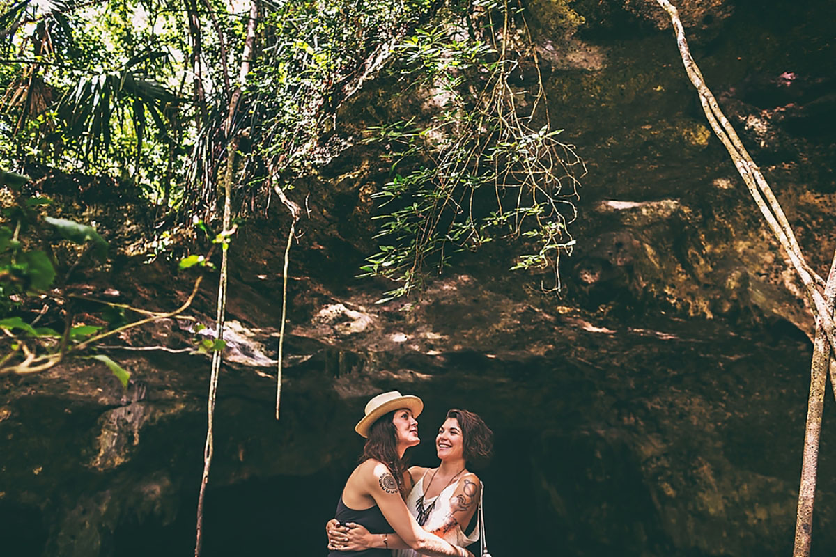 Mystical surprise proposal inside a Mexican cenote two brides Mexico tattoos jungle