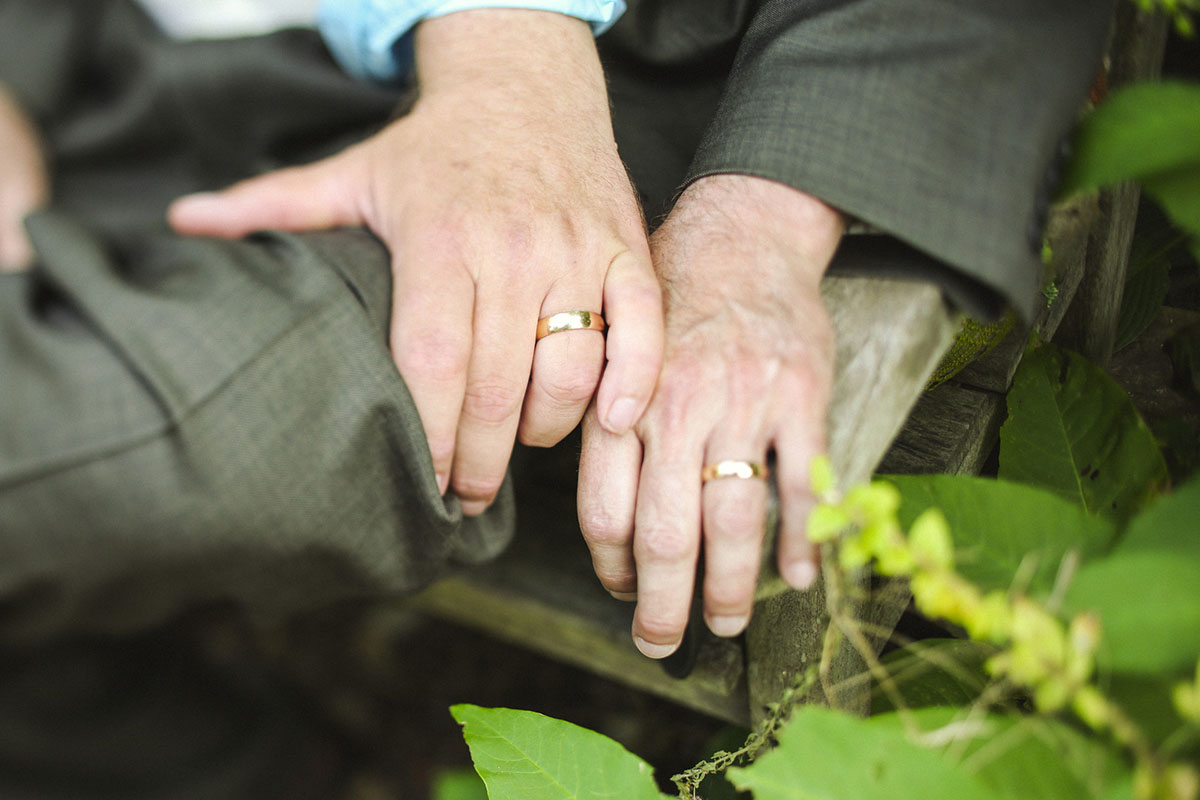 Unique and nostalgic backyard wedding after 29 years together rings bands