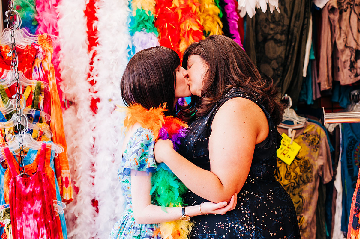 I proposed to my high school sweetheart—here's how we make it work two brides lesbian couple beach engagement books literature Harry Potter feather boa colorful