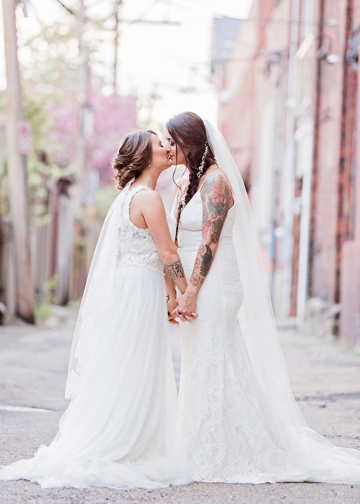Rainbow double wedding inspiration two brides two grooms Pride colorful white dresses tattoos