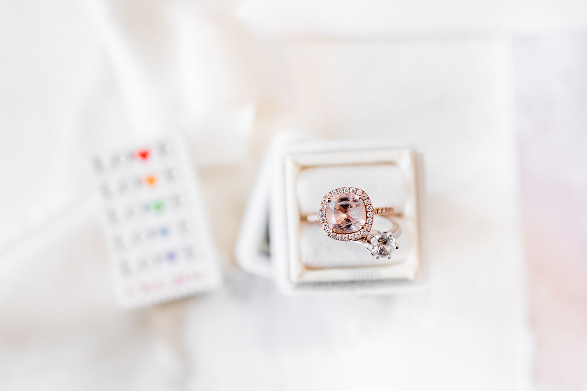 Rainbow double wedding inspiration two brides two grooms Pride colorful rose gold engagement ring