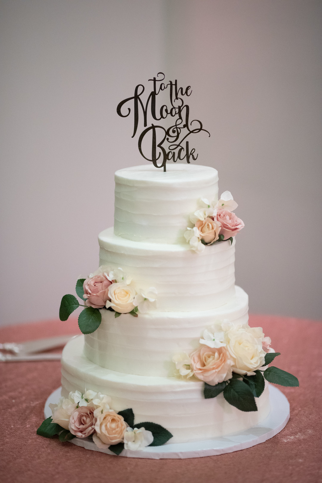Rustic wedding in Columbus, Ohio blush flowers floral wedding cake cream to the moon and back