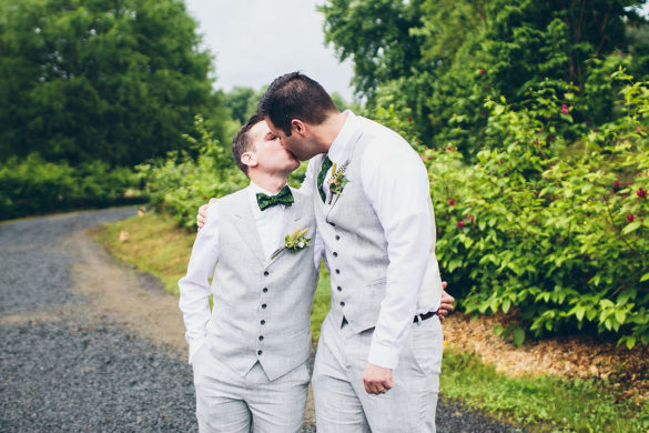 Flower farm wedding with s'mores bar two grooms gay queer wedding elopement grey suits matching green bow ties
