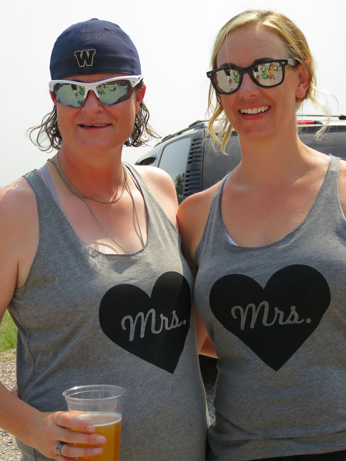 Rustic castle wedding at Guernsey State Park in Wyoming lesbian two brides Mrs. Mrs. tank tops