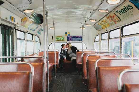 Vintage bus engagement photos in Seattle, Washington two brides argyle sweater houndstooth dress black and white rainy