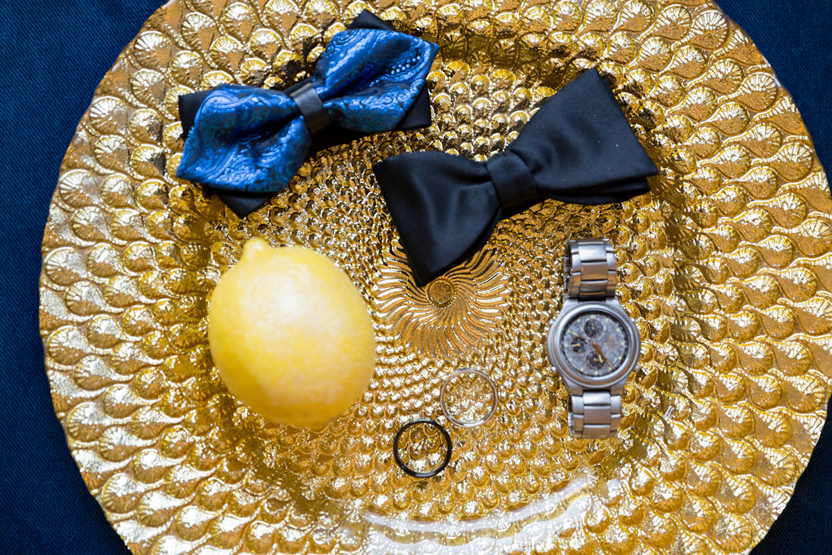 Blue and gold New Year's Eve elopement inspiration bow ties wedding rings lemon watch