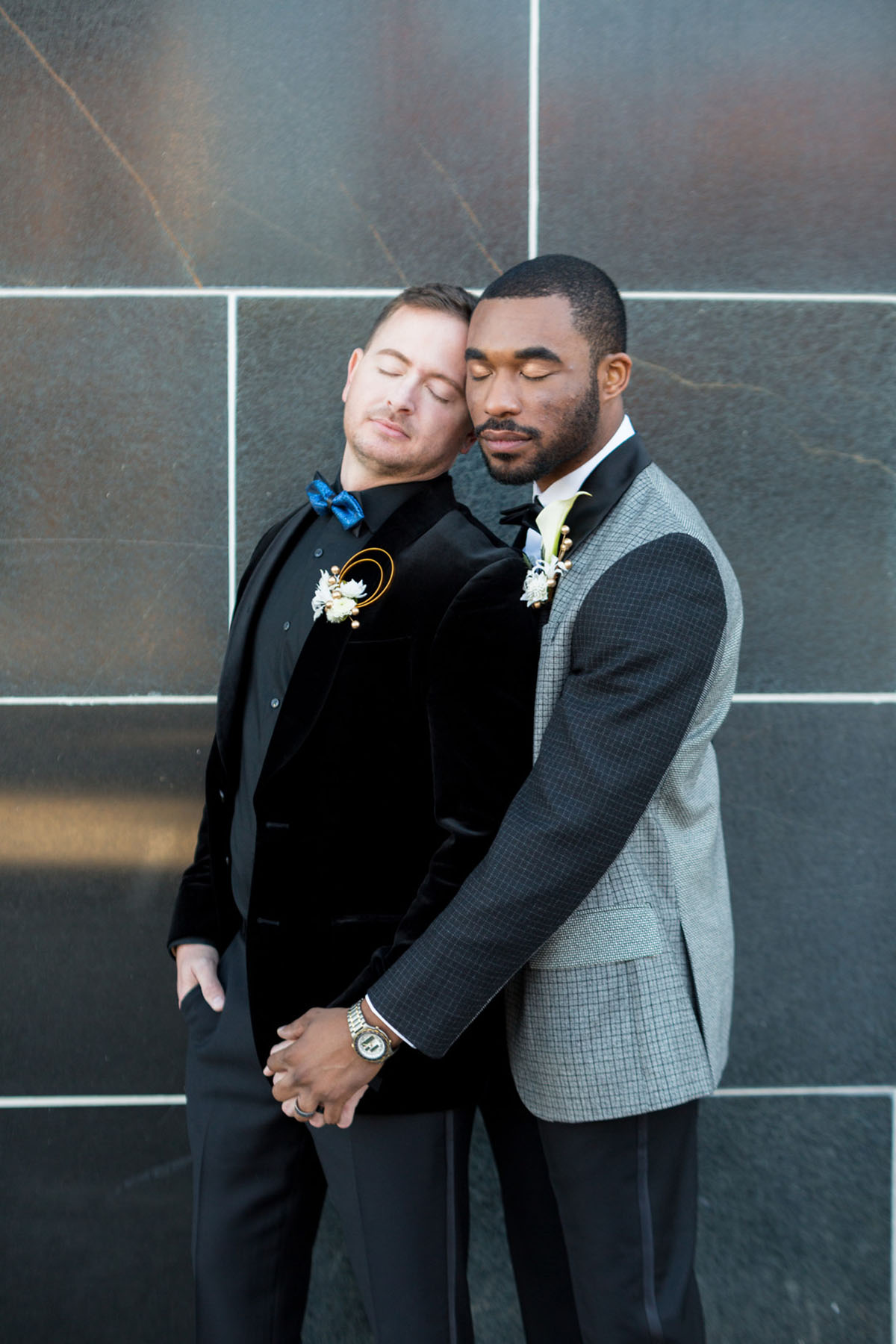 Blue and gold New Year's Eve elopement inspiration all black party black tuxedos two grooms bow ties