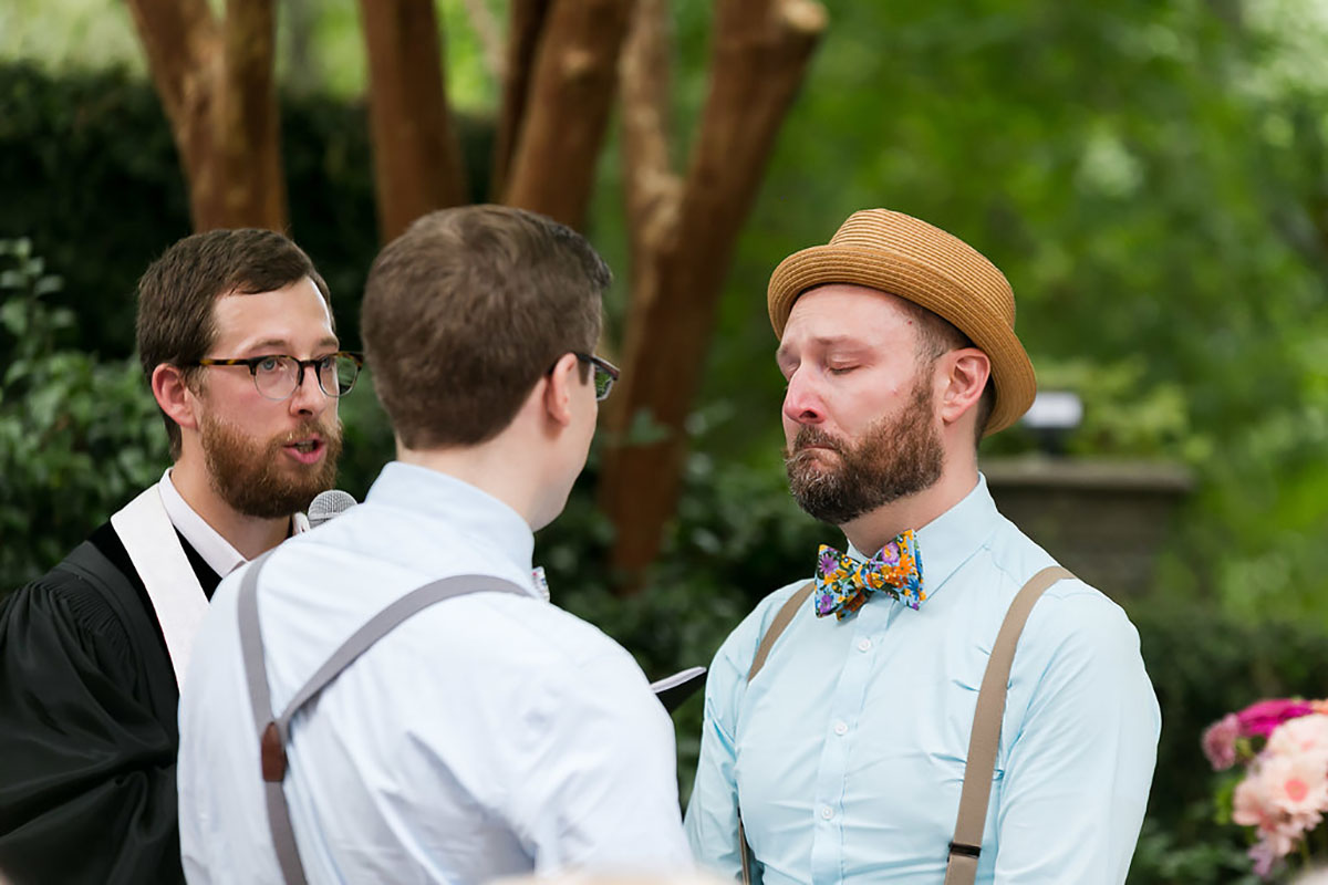 Casual outdoor wedding at the Garden Club of Georgia two grooms suspenders colorful bow ties fun eclectic vows