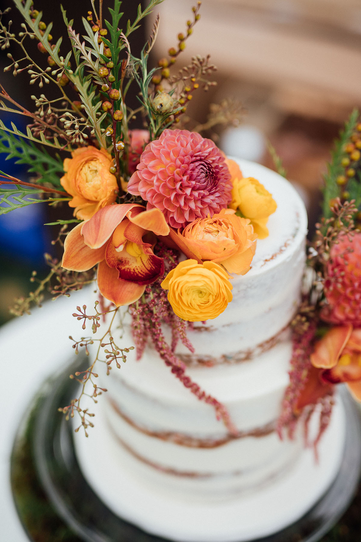Rustic mountain wedding at the Art Nord Trailhead colorful wedding cake