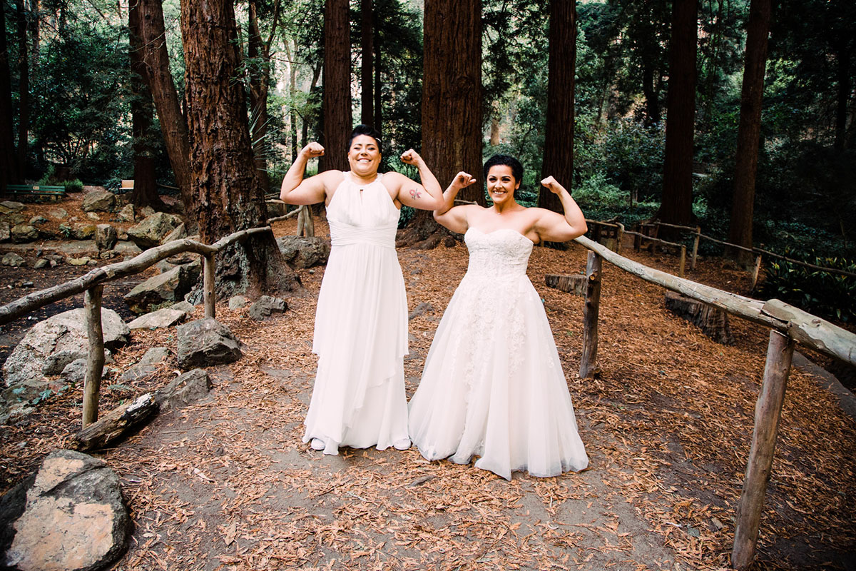 This couple got married in San Francisco during the California wildfires two brides breast cancer survivor white lace dresses strong