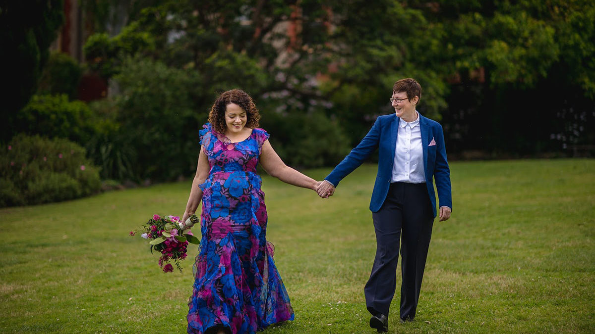 Vibrant, colorful blue and fuschia Australia wedding