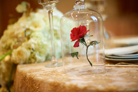 You'll want to a be a guest at this couple's Beauty and the Beast inspired wedding glass rose